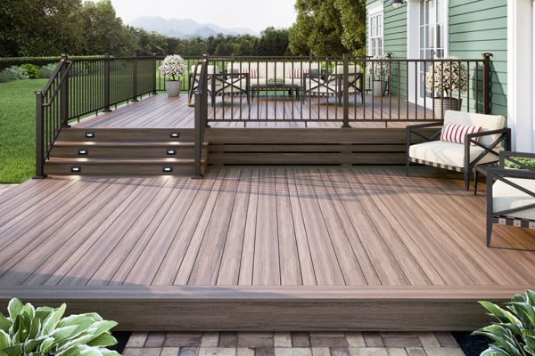 Deckorators Voyage Varied-Plank Decking in Mesa with ALX Contemporary Railing in Weathered Brown
